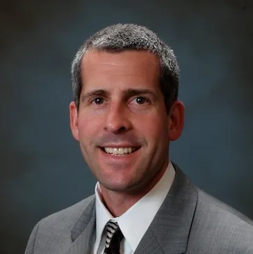 Confident mature businessman smiling portrait